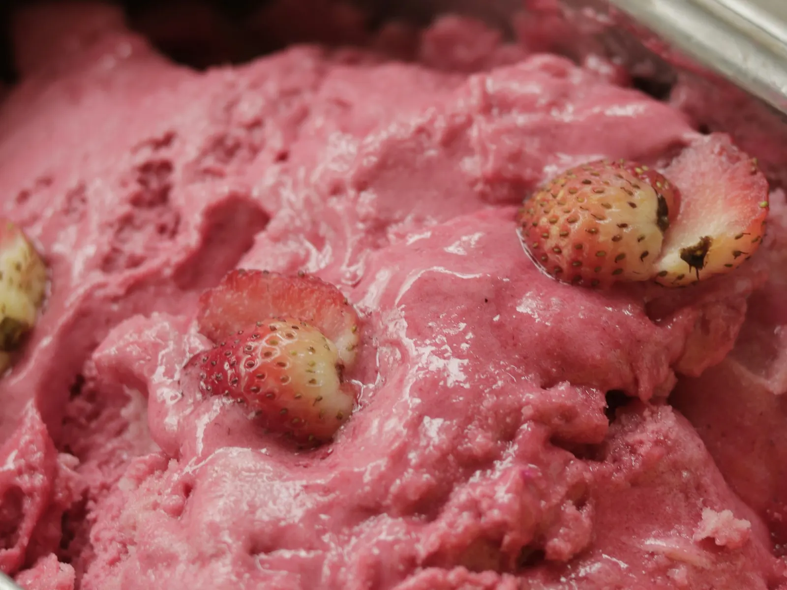 Strawberry cottage cheese ice cream in a container
