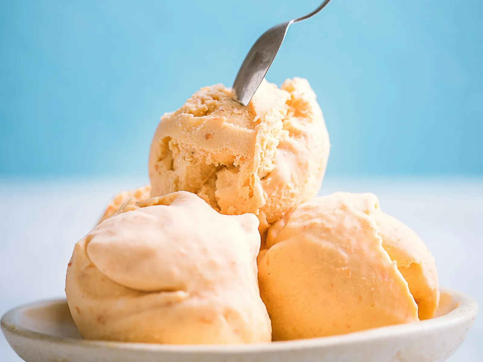 Scoops of vanilla protein ice cream in a bowl