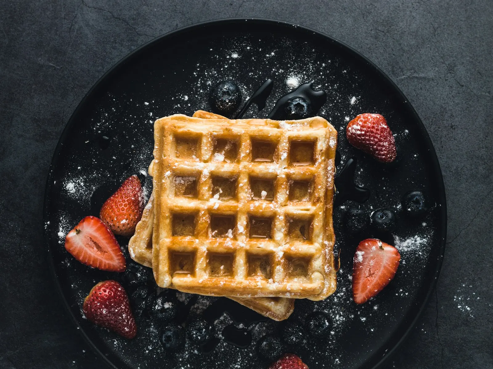 Square protein waffle with fresh strawberries
